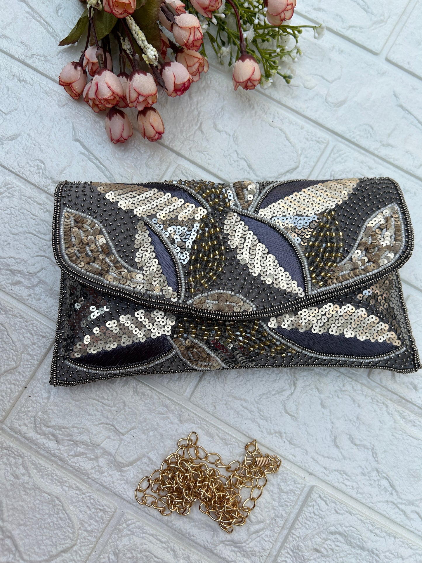 Peacock clutch