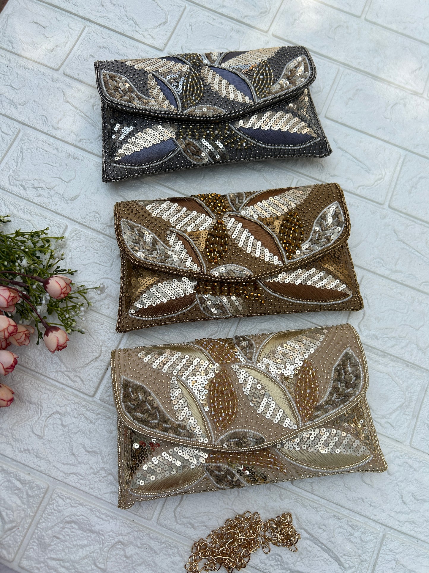 Peacock clutch