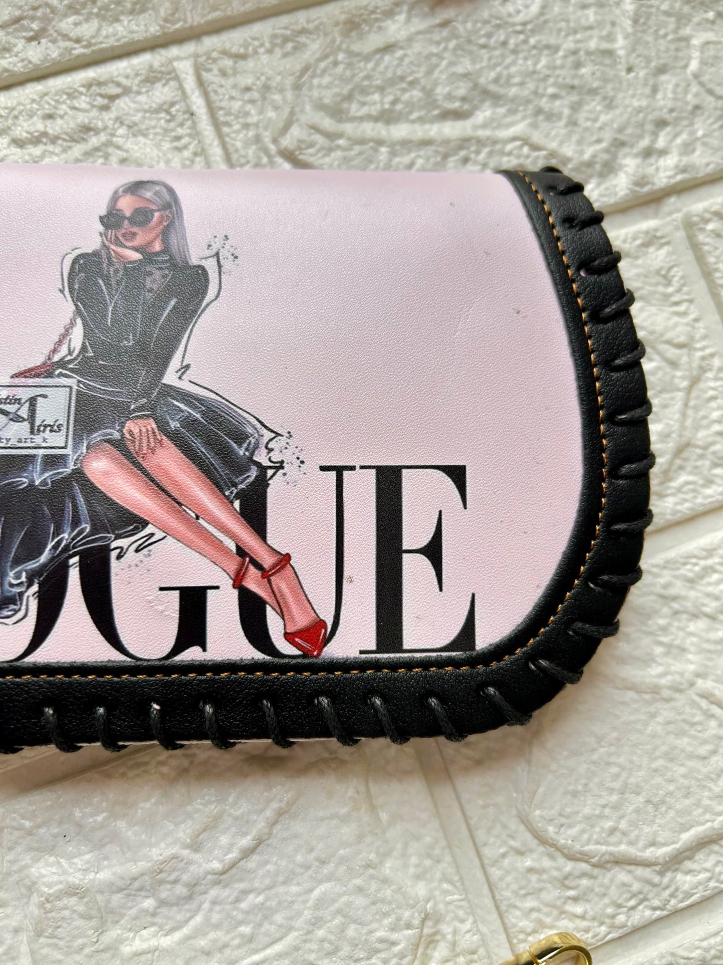 Rang Raze Clutch sling