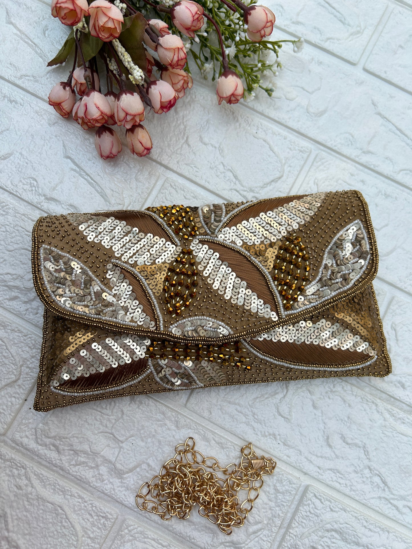 Peacock clutch