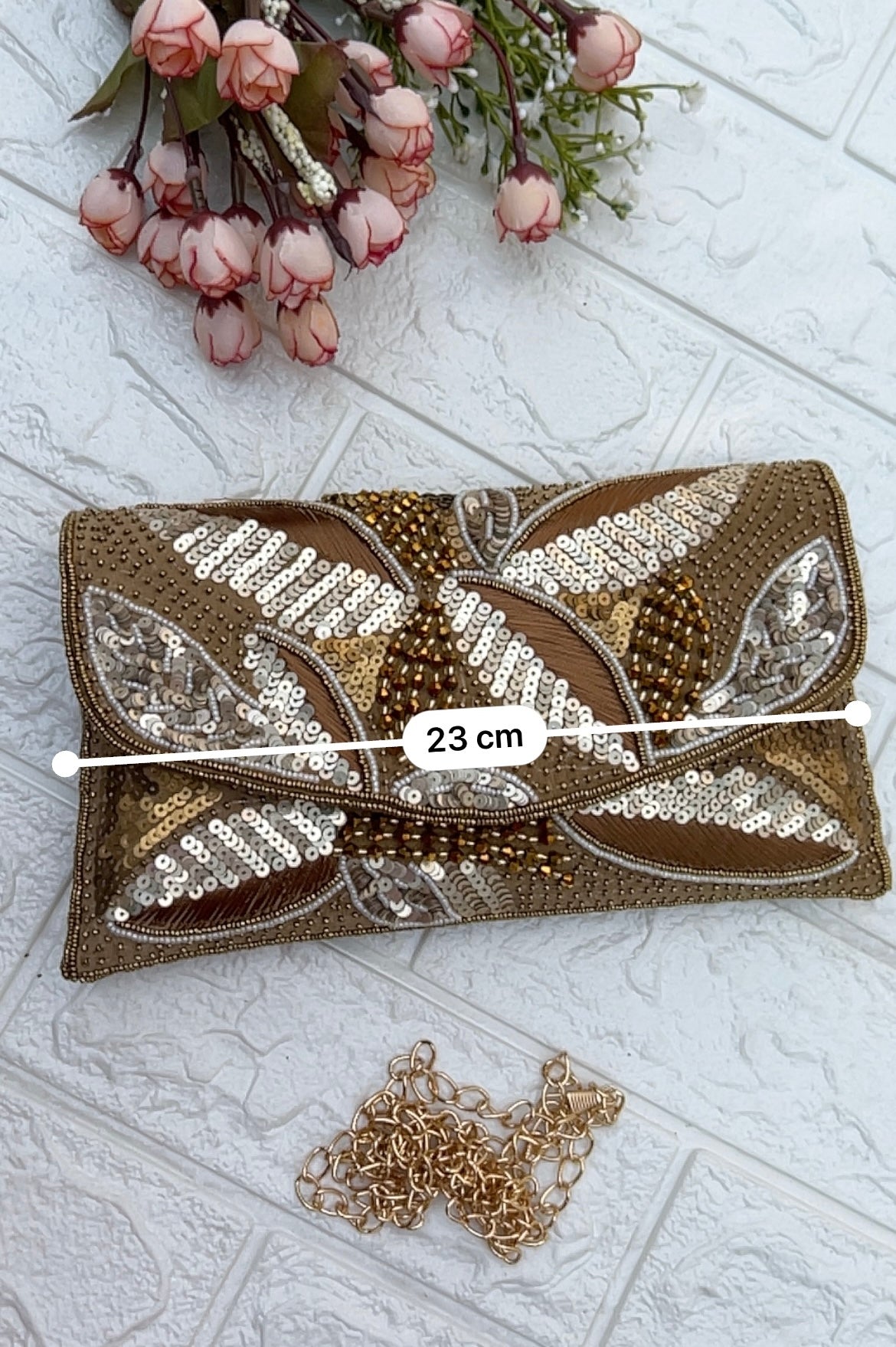 Peacock clutch