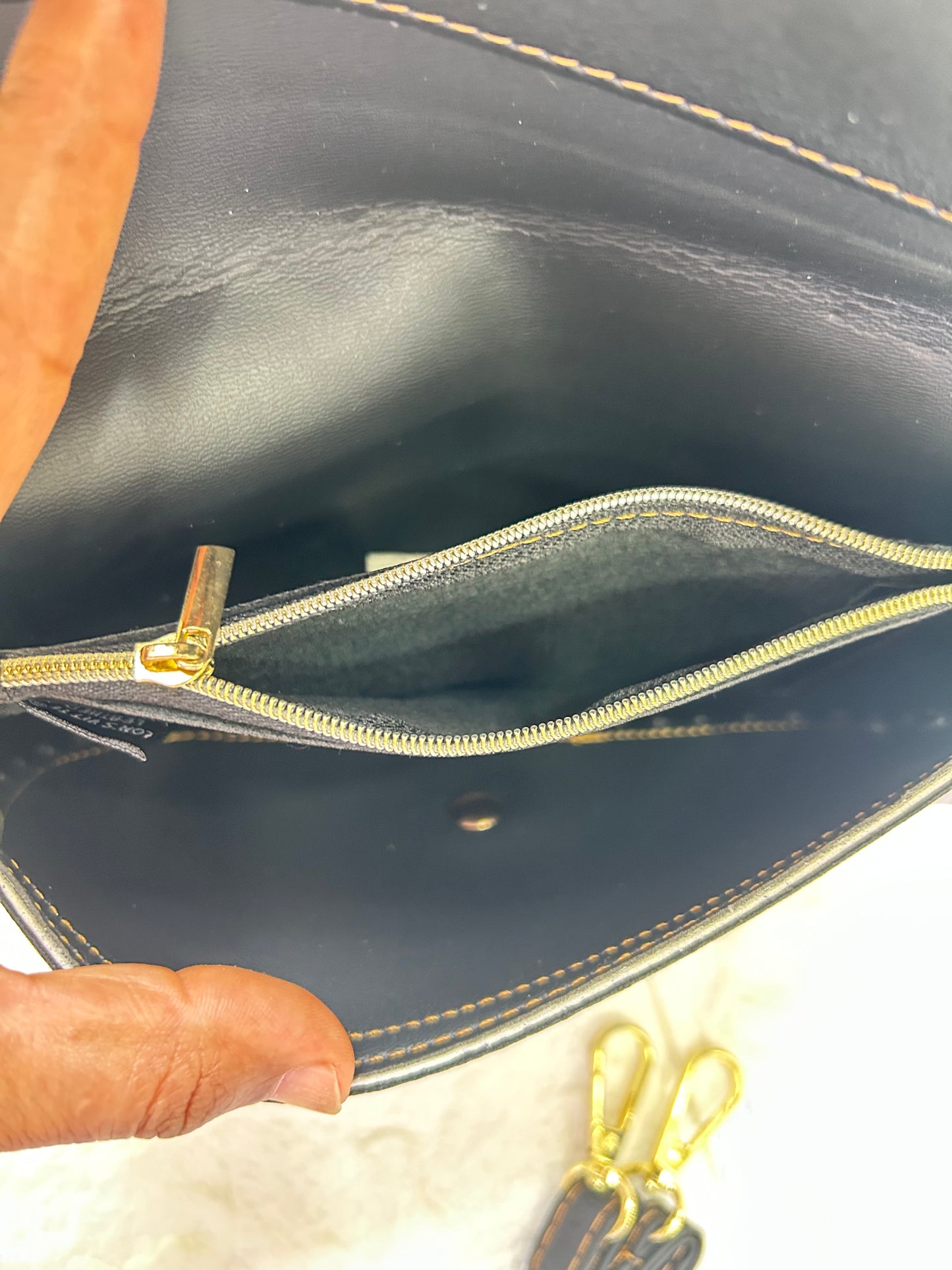 Rang Raze Clutch sling
